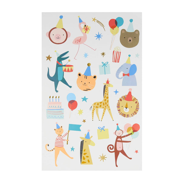 Illustration of various animals, including a bear, giraffe, and lion, celebrating with balloons, cakes, and hats on a white background. They are also adorned with vibrant Meri Meri Animal Parade Tattoo Sheets featuring animal designs.