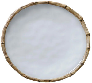 This round white plate from the Beatriz Ball Vida Natural Bamboo Dinnerware Collection features a bamboo-style rim, blending luxury style with break-resistant melamine.