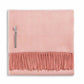 The Classic Herringbone Throw Collection by Alicia Adams Alpaca features a pink wool throw with fringe, crafted from baby alpaca wool in Peru. Fair-trade and elegant, it adds warmth and style to any space.