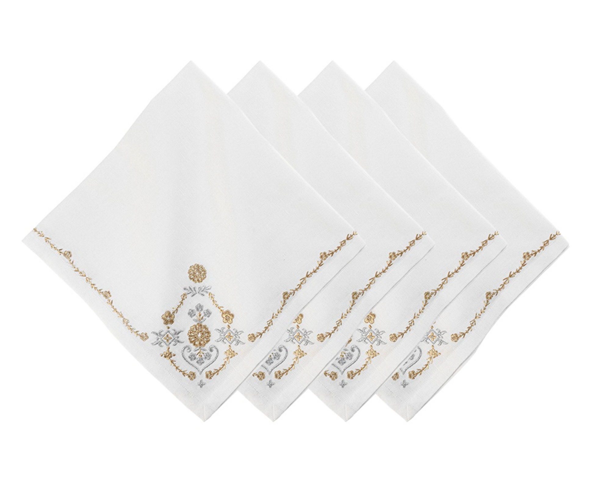 Four napkins from the Juliska Heidi Gold/Silver Embroidered Napkin Set are arranged in a fanned stack. Each white linen-blend napkin is embroidered with gold and gray floral and scroll designs, accented by an Alpine motif in one corner.