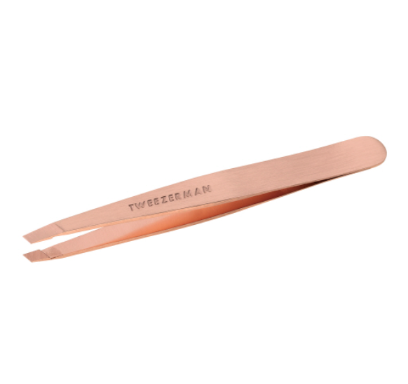 Tweezerman Classic Slant Tweezer in rose gold, ideal for precise eyebrow shaping, shown against a white background.