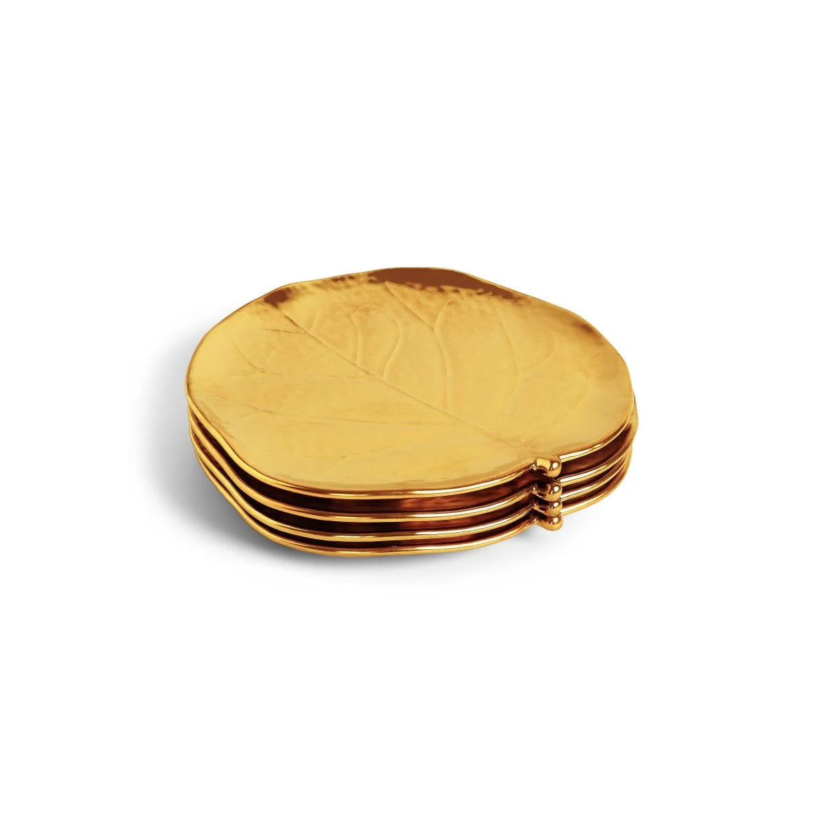 A set of four round, gold Botanical Leaf Tidbit Plates by Michael Aram, featuring a delicate leaf design and neatly arranged on a white background—ideal as elegant organic table decor.