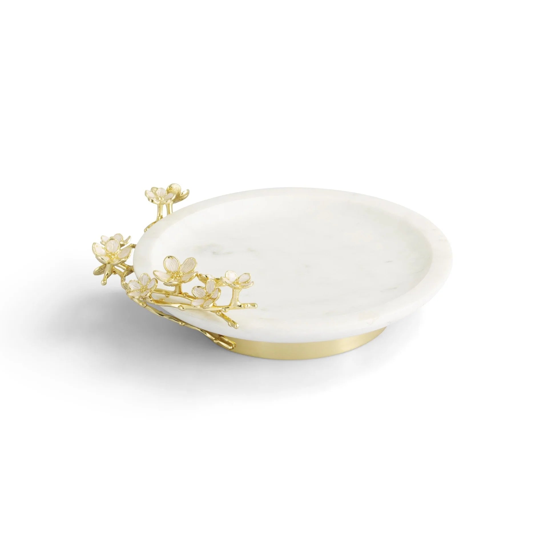 From the Cherry Blossom Collection by Michael Aram, a round white marble dish features gold floral accents inspired by Japanese motifs, displayed on a plain white background.