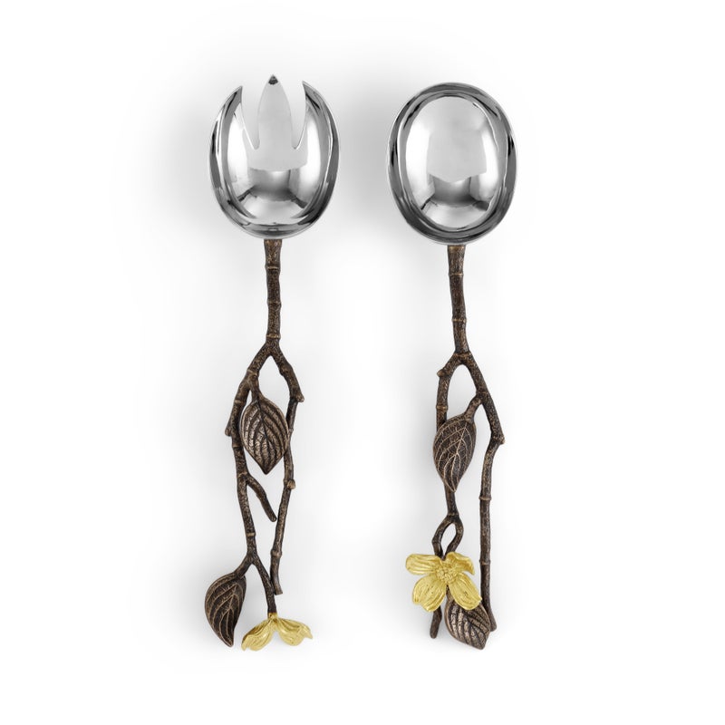 From the Michael Aram Dogwood Serveware Collection, these two serving utensils feature branch-shaped metal handles with leaf and flower accents—one solid, one slotted—for a nature-inspired touch.