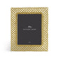 The Love Knot Gold Frame Collection by Michael Aram features a rectangular frame with an intricate gold lattice design, beautifully symbolizing unity, and includes a placeholder marked "Michael Aram" with the size 8x10.