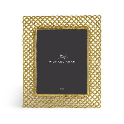 The Love Knot Gold Frame Collection by Michael Aram features a rectangular frame with an intricate gold lattice design, beautifully symbolizing unity, and includes a placeholder marked "Michael Aram" with the size 8x10.