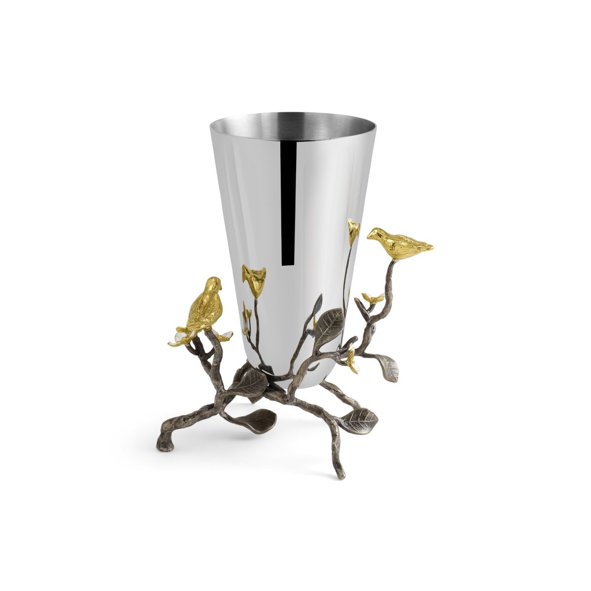 The Michael Aram Lovebirds Vase Collection features a shiny silver vase supported by a sculpted metal branch adorned with gold-tone birds and flowers, creating a striking Tree of Life accent for your decor.