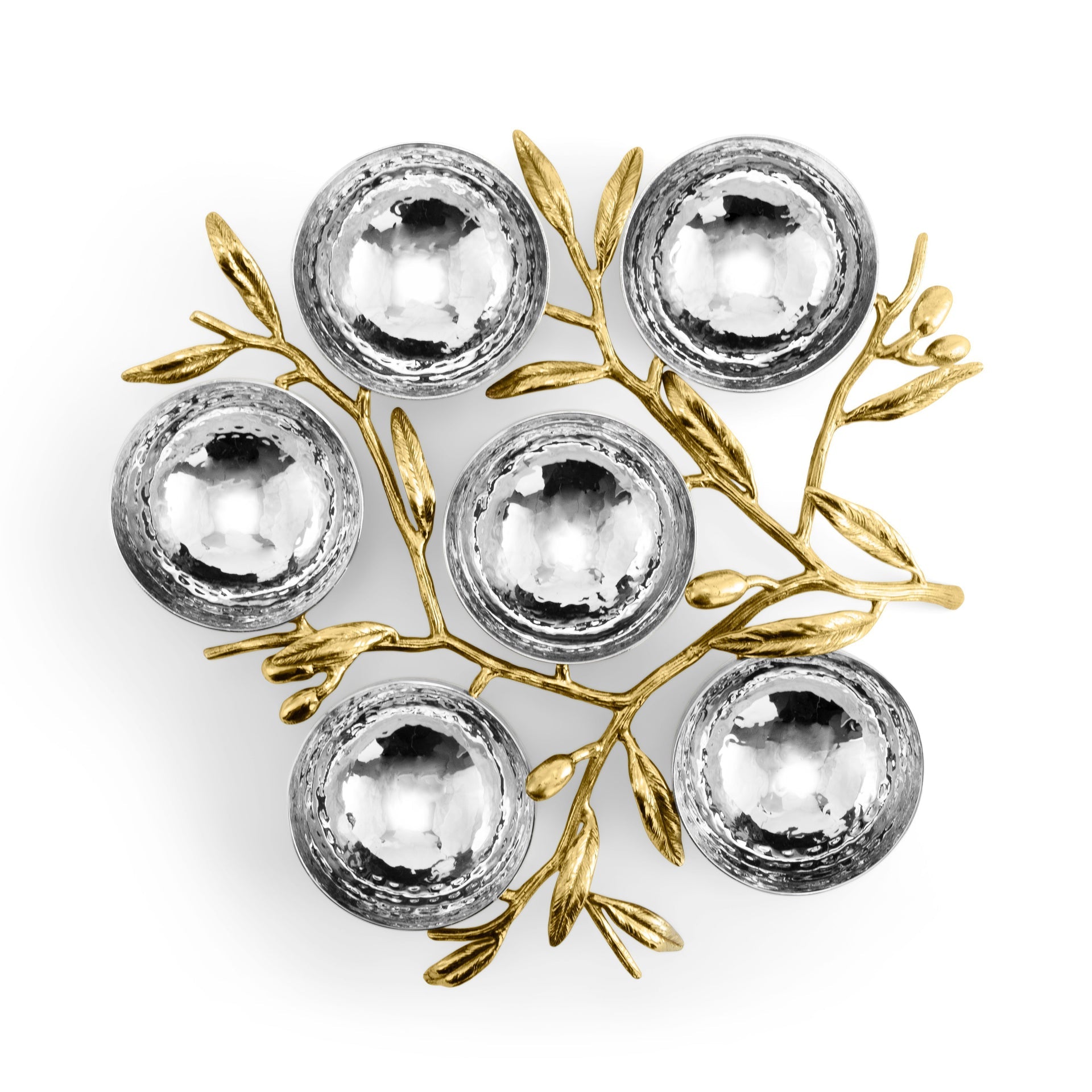 Six silver hammered metal bowls from the Michael Aram Olive Branch Judaica Collection, arranged in a cluster and joined by gold-toned leafy branches, evoke a menorah silhouette against a white background.