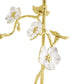 The Michael Aram Orchid Decorative Object features a gold metal branch with white and gold flower accents, textured petals and leaves, making it a striking sculptural decor piece for any home.