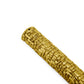 The Palm Mezuzah by Michael Aram is a gold textured cylindrical object with an antique gold finish and sculpted textures, featuring a woven basket-like pattern, positioned diagonally on a white background.
