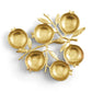 The Michael Aram Pomegranate Seder Plate features six round compartments shaped like pomegranates on a gold-toned branching vine with leaves, capturing the elegance and symbolic beauty of home accents from the renowned Pomegranate Collection.