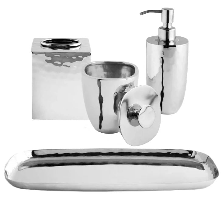 Elevate your bathroom with the Michael Aram Reflective Bath Collection: this five-piece polished stainless steel accessory set features a sleek tray, tissue box, soap dispenser, tumbler, and lidded container—an elegant way to organize your countertop essentials.