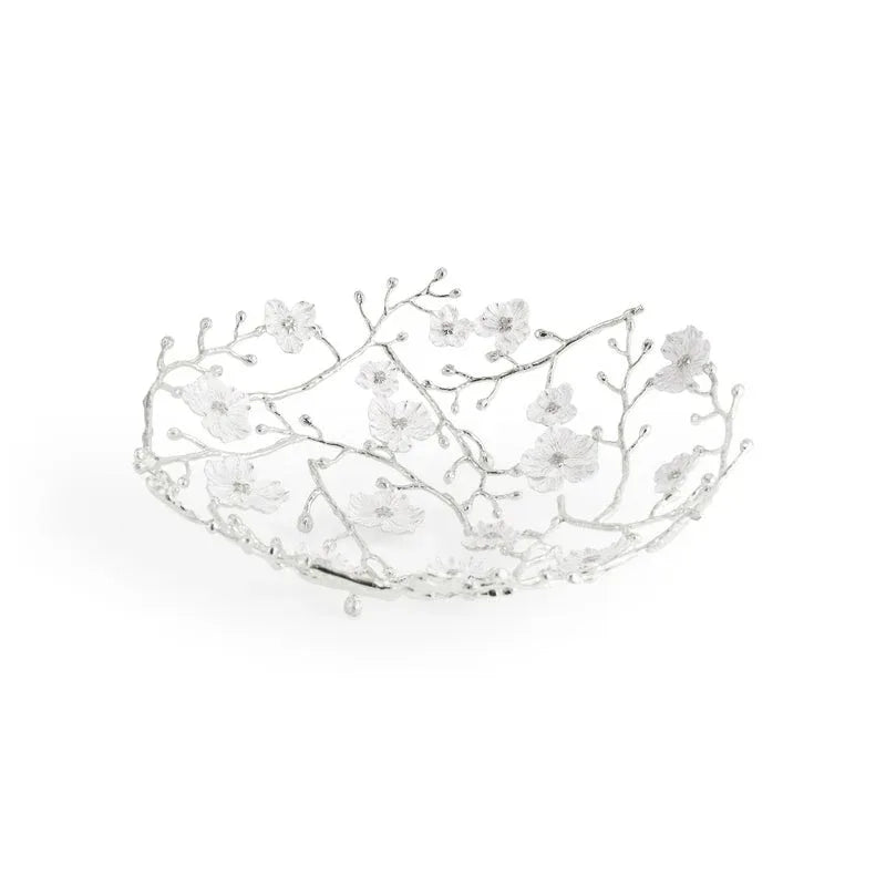 Shallow decorative bowl from the Michael Aram Silver Orchid Collection, crafted in silver metal with an openwork floral branch motif featuring graceful flower and leaf details.