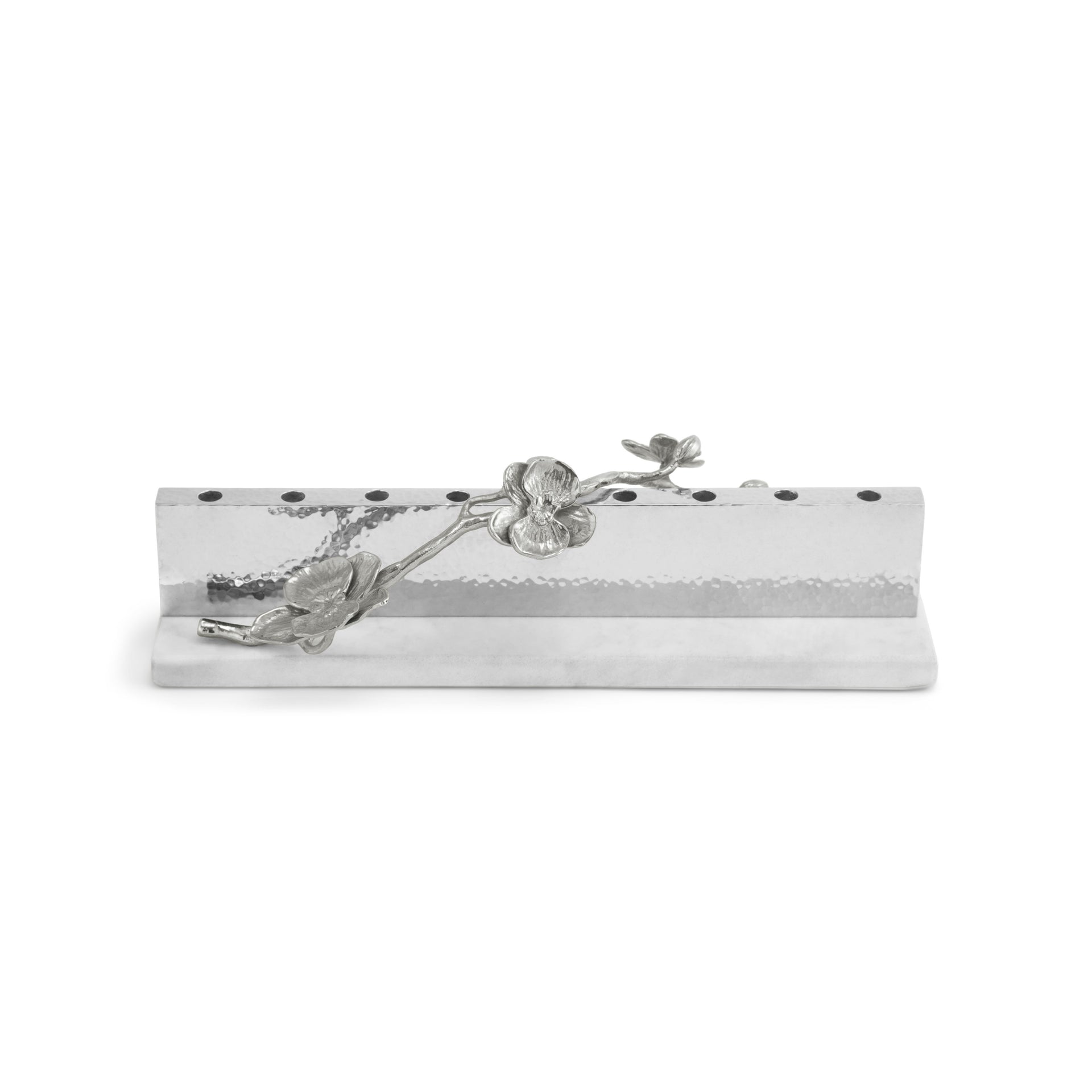 Rectangular silver pen holder from the Michael Aram White Orchid Judaica Collection, featuring a textured surface with black dots and an elegant flower and branch motif on the front.