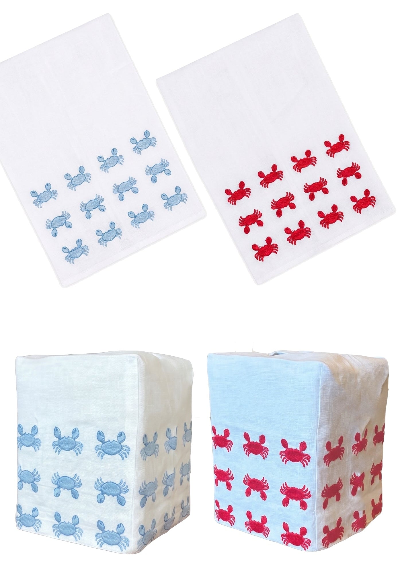Two white linen cloths from the Haute Home Mini Crab Bath Collection, featuring blue and red crab patterns, are displayed flat and wrapped around square objects on a white background—perfect as an elegant tissue box cover.