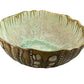 The Sea Urchin Bowl Collection by AE Ceramics features hand-molded ceramic bowls with green and brown glaze, textured exterior, and scalloped rim—unique tabletop pieces for your coastal dinnerware collection. Shown on a white background.