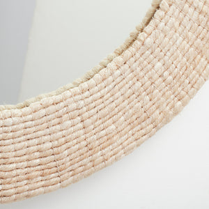 A close-up of the Made Goods Amani Round Abaca Rope Mirror, featuring a thick, woven organic abaca rope border, set against a white background.