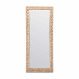 The Gene Mirror by Made Goods is a rectangular full-length mirror with a wide, light brown abaca fiber frame featuring an oversized basket weave design, shown against a plain white background.