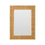 The Isla Mirror by Made Goods features a rectangular rattan frame with a wide, light brown woven border and natural finish, displayed against a plain white background.