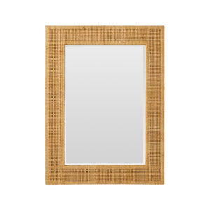 The Isla Mirror by Made Goods features a rectangular rattan frame with a wide, light brown woven border and natural finish, displayed against a plain white background.