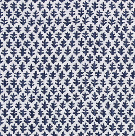 The Burma White Indigo Outdoor Lumbar Pillow from Associated Design features quality white fabric with dark blue leaf patterns in neat rows—ideal for adding a timeless touch to your outdoor decor.