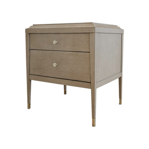 The Hickory Chair Andrew Side Table features light wood beeswing primavera, two drawers with metal pulls, and elegant tapered legs—pictured on a white background—making it an ideal stylish addition to any modern bedroom.