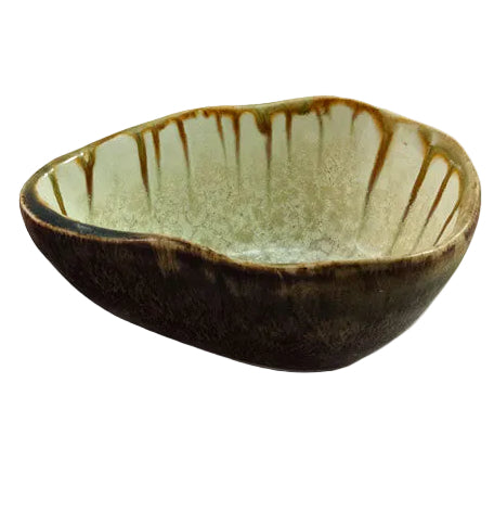 The AE Ceramics Large Sauce Bowl Collection features ceramic bowls with irregular, organic shapes and a greenish-white and brown mottled glaze—perfect for bringing handmade charm to your coastal tableware collection.