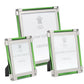 Three Moss Green Classic Frame Collection photo frames by William Yeoward Crystal, each upright and varying in size, feature green edges, silver corners, a bright finish, and elegant nickel plating.