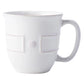 A white ceramic mug with a handle, featuring embossed rectangular patches and a small dot pattern in the center, reminiscent of the Juliska Berry & Thread French Panel Collection by Juliska.