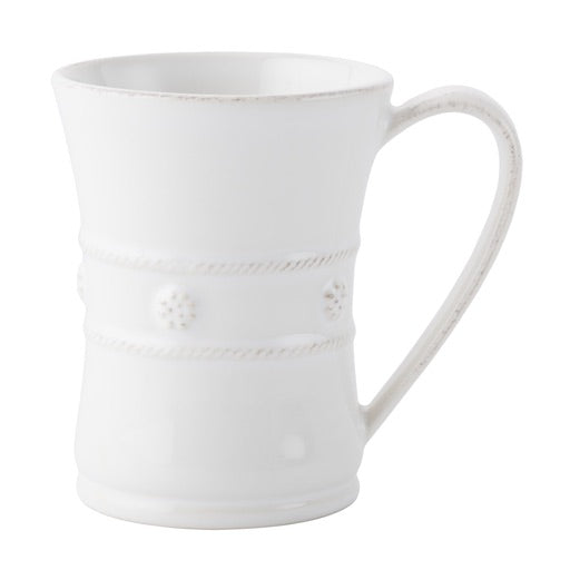 A white ceramic mug from Juliska’s Berry & Thread Classic Whitewash Dinnerware Collection features a flared rim, rope-like band, and ornate handle, displayed on a plain white background.