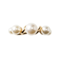 The Kim Seybert Pearl Drift Napkin Ring in Pearl/Gold features four white pearls in a twisted gold design, adding elegance to any formal table setting.
