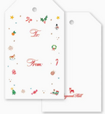 Two white Season’s Trinkets Gift Tag Set tags with a hole at the top, one featuring a border of colorful Christmas-themed icons and the text “To:” and “From:”.
