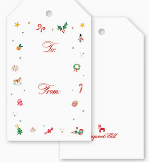 Two white Season’s Trinkets Gift Tag Set tags with a hole at the top, one featuring a border of colorful Christmas-themed icons and the text “To:” and “From:”.