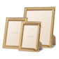 Three gold Loretta frames by Aerin, each with a twist design border, stand upright on a white background. Elegant placeholders display "AERIN," showcasing the refined style of this frame collection.