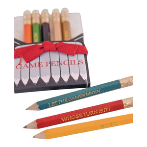 The Karen Adams Game Pencil Set includes six mini pencils in a box with a red bow; three feature "LET THE GAMES BEGIN…," "WHOSE TURN IS IT?" and "SCORE!"—making them perfect for your next game night.