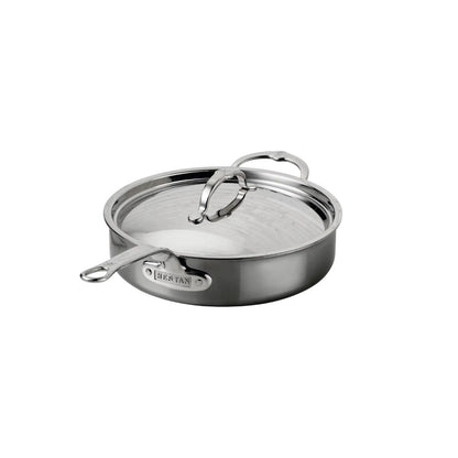 The Hestan NanoBond Covered Sauté, a stainless steel pan with lid and two handles, is ideal for searing meats or braising one-pot meals, shown against a white background.