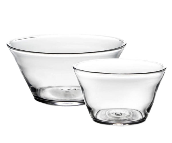 Two transparent bowls from the Simon Pearce Nantucket Bowl Collection, each of different sizes, are placed side by side to create an elegant Simon Pearce centerpiece against a pristine white background.