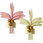 The Duggan Society Palm Napkin Ring comes in sets of two, each handwoven from Iraca Palm with trunks in pink/beige or yellow/beige, finished with three pinecone-like accents at the base.
