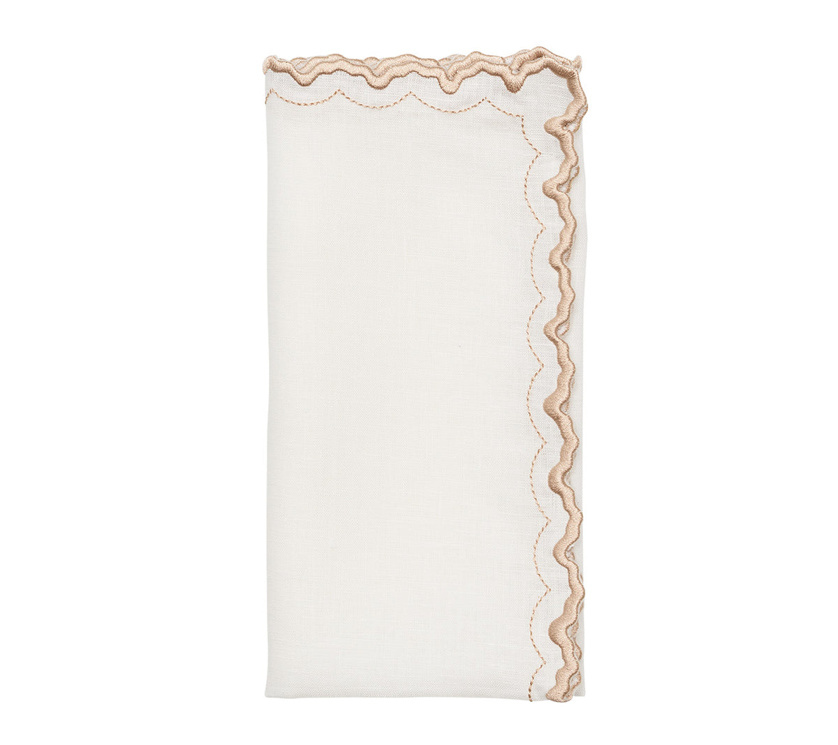 The Arches Napkin Set by Kim Seybert features folded white linen napkins with scalloped beige embroidered edges, perfect for formal dining and shown on a plain white background.