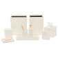 The Pigeon & Poodle Navagio Bath Collection set of off-white bathroom accessories, including a wastebasket, soap dispenser, tissue box cover, trays, and containers in spiraled burl resin.