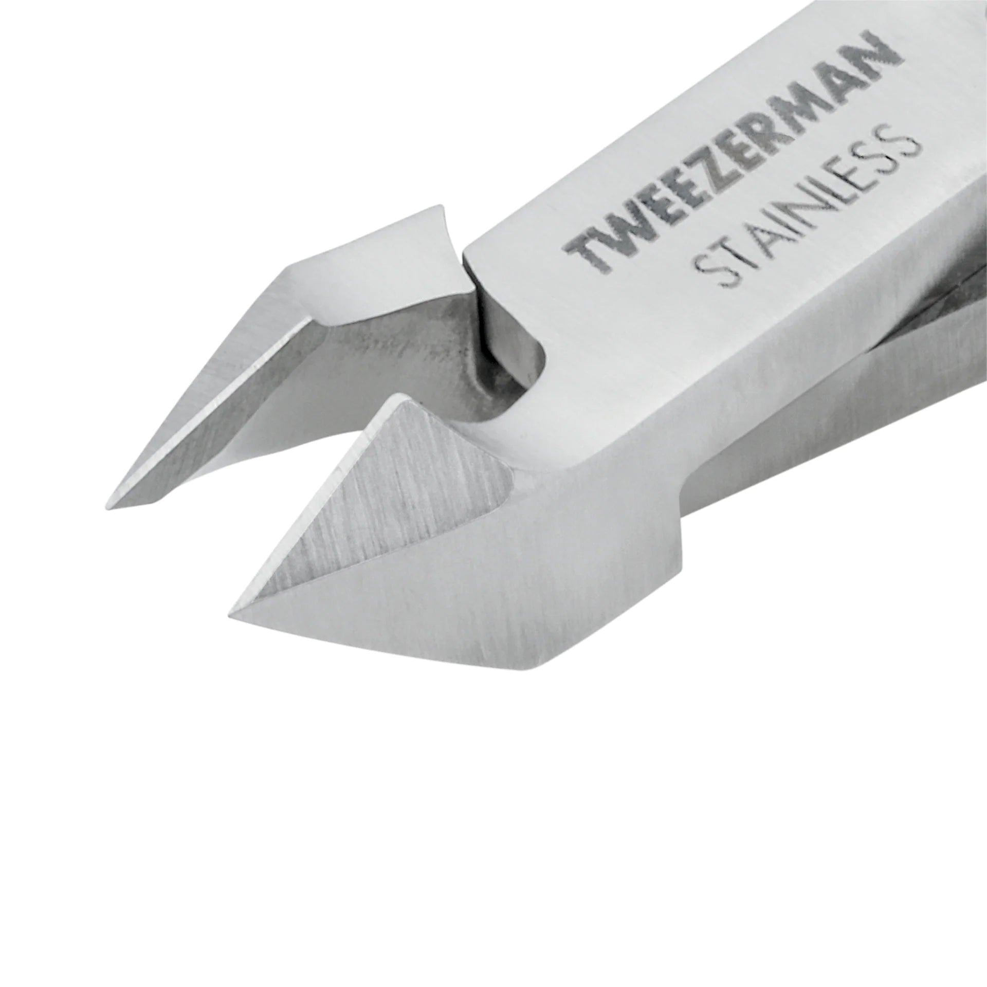 Close-up of the Tweezerman Rockhard Stainless Steel Cuticle Nipper, showing sharp, angled blades and engraved branding on the handle—ideal for precise at-home manicures.