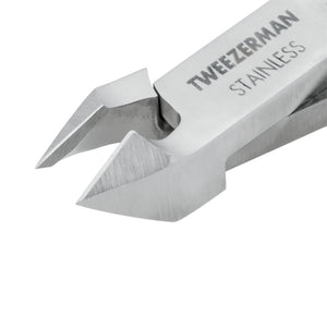 Close-up of the Tweezerman Rockhard Stainless Steel Cuticle Nipper, showing sharp, angled blades and engraved branding on the handle—ideal for precise at-home manicures.