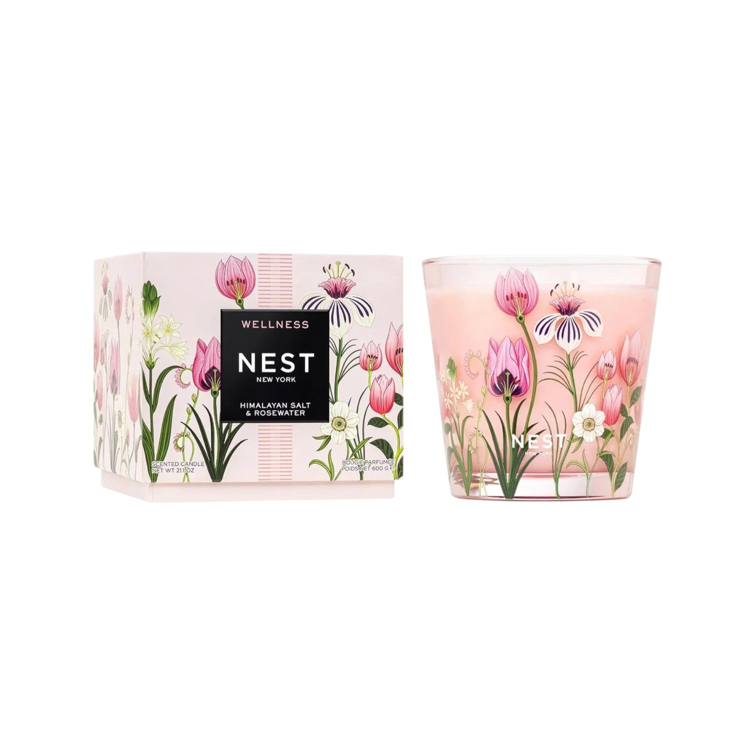 A Nest Himalayan Salt & Rosewater Candle Collection candle and its box, both adorned with pink and purple floral designs, features a long-lasting fragrance.