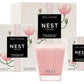 Three boxes from the Nest Himalayan Salt & Rosewater Candle Collection and a pink glass candle are displayed against a white background, highlighting the soothing rosewater and amber notes.