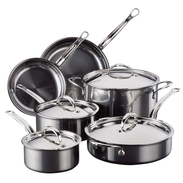 The Hestan NanoBond Titanium Ultimate Cookware 10-Piece Set, featuring four pots with lids and two pans with long handles, is elegantly displayed against a plain background.