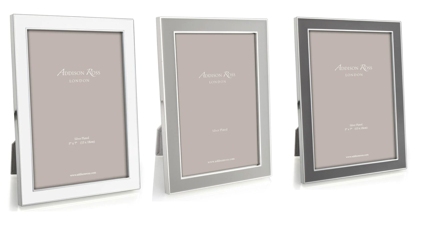 Three Addison Ross Enamel and Silver Frame Collection pieces, each with a silver-plated finish and two-way easels, display blank images from a front-side angle against a white background.