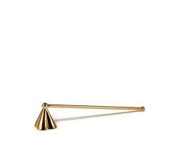 The Aerin Petal Candle Snuffer features a gold-colored metal design with a long handle and cone-shaped tip, shown on a white background.