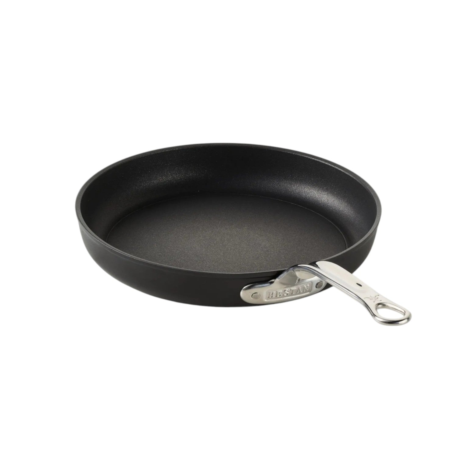 The Hestan TITUM® Fusion Collection nonstick pan features black diamond reinforcement and a silver metal handle, displayed on a white background.