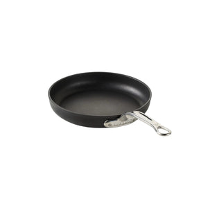 A black TITUM® Fusion Collection nonstick pan by Hestan, made in Italy with a silver handle, is displayed on a white background.