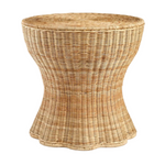 The Made Goods Nevis Side Table showcases a round wicker design with a tapered silhouette, flared base, and woven light brown pattern, shown isolated on a white background.